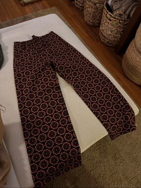 The Colette Anthropologie 26 Wide Leg Floral Pattern Pants in Black and Rust